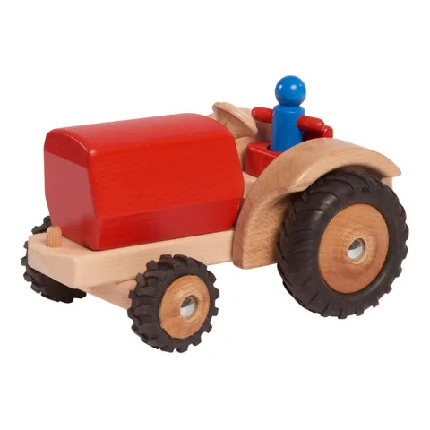 Roter Traktor aus Holz mit Fahrerfigur
